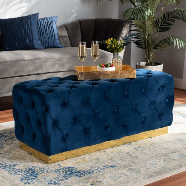 Corrine Glam and Luxe Navy Blue Velvet Fabric Upholstered and Gold PU Leather Ottoman
